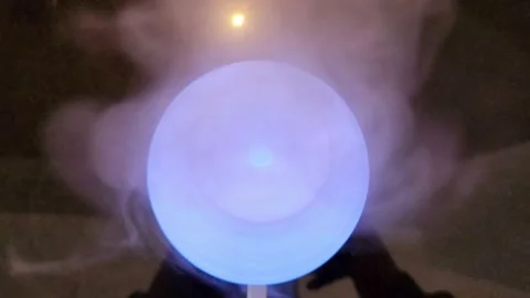 Top down view of diffuser blowing out steam, 4K Stock Footage 227473572