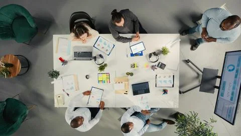 Top down view of diverse work team in multinational company Stock Photos