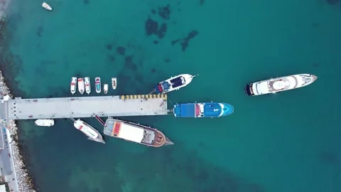 Top down view from drone from small city port in Parga Greece. Cloudy day. Cinem Stock Footage 214021862
