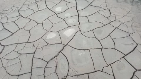 Top Down View of Dry Cracked Clay Mud and Drought Ground Pattern Stock Photos