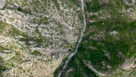 Top Down View of Dry Riverbed in Rocky Gorge Stock Footage 336564313