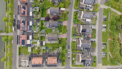 Top-Down View of Dutch Suburb with Modern Homes and Rooftop Solar Panels Video stock 312797465
