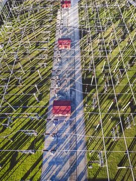 Top down view of electrical wires running around at the electrical substation Stock Photos