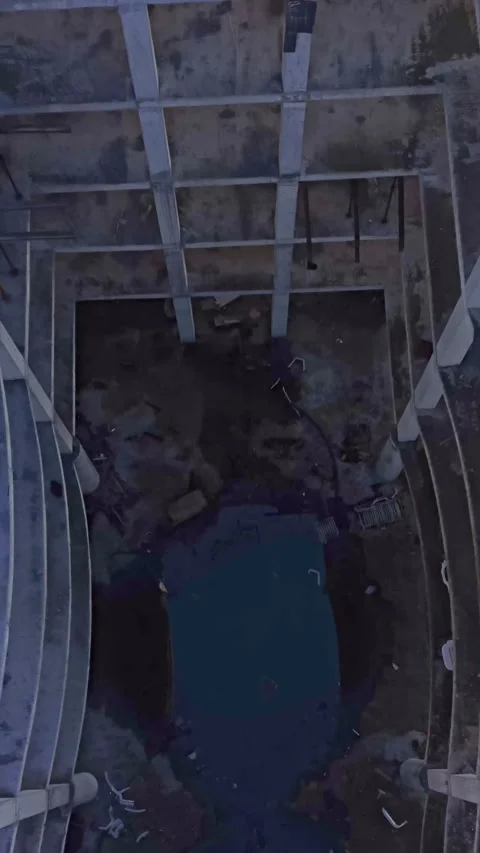 Top down view of an elevator shaft or courtyard Vertical video. Stock-Footage 332343272