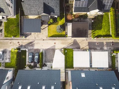 Top down view of an empty street in a suburban area with family homes Stock Photos