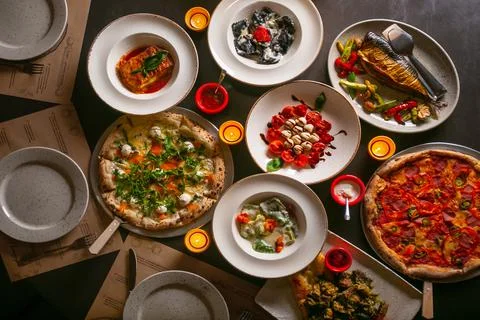 Top down view on enormous buffet of delicious freshly prepared european cuisine Stock Photos