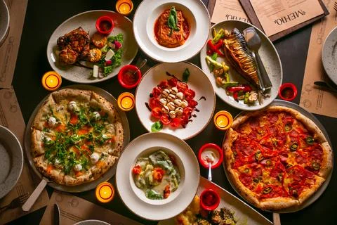 Top down view on enormous buffet of delicious freshly prepared european cuisine Stock Photos