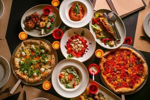 Top down view on enormous buffet of delicious freshly prepared european cuisine Stock Photos