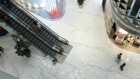 Top down view to escalator inside icon siam department store with people to.. Stock Footage 276353304