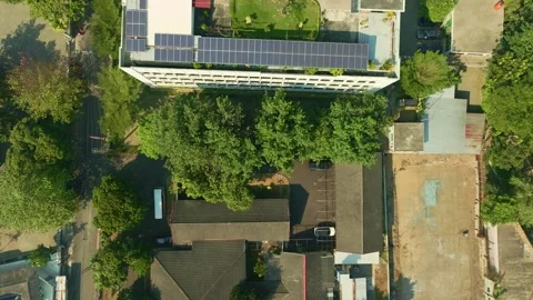 Top down view of extensive rooftop solar panel array Video stock 342581330
