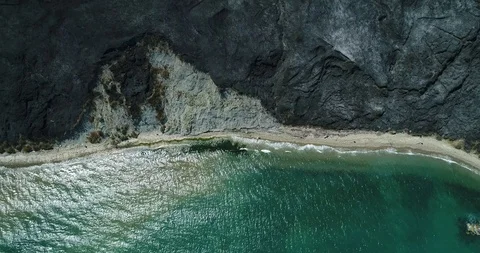 Top down view of extinguished fire along the coast 스톡 동영상 128294701