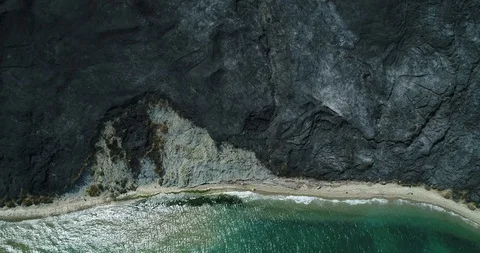 Top down view of extinguished fire along the coast 스톡 동영상 128294827
