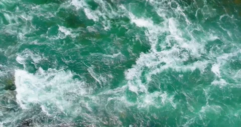 Top down view of fast moving river with rapids. 스톡 동영상 252241856