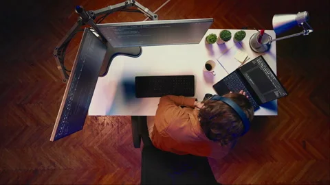 Top down view of fatigued software technician taking break Stock-Footage 265345371