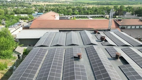 Top-down view features solar panels on a red roof Stock Footage 340240491