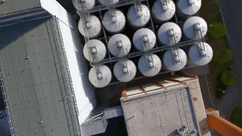 Top Down view of Fermentation Tanks in Brewery, Pilsen, Czechia - Aerial Drone Stock Footage 320286670