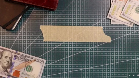 Top down view of finance mockup with cash and wallet around tape Stock Footage 338183778
