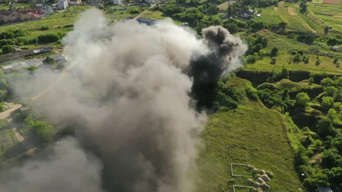 Top down view at fire at garbage dump, 4k Stock Footage 136375866