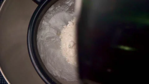 Top down view of flour being sifted Video stock 168466439