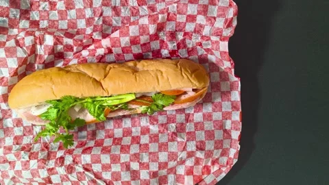 Top down view of fresh crispy Subway sandwich with ham, tomato, cucumber, l.. Stock Footage 318254006