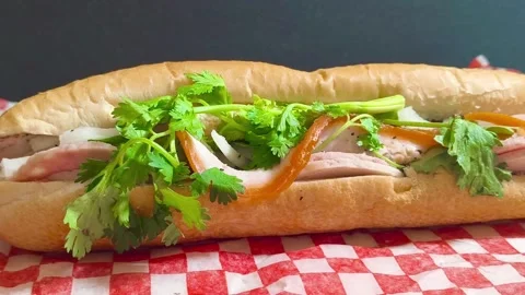 Top down view of fresh crispy Subway sandwich with ham, tomato, cucumber, l.. Stock Footage 318254137