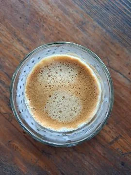 Top Down View of Freshly Brewed Acehnese Sanger Coffee with Rich Crema Foam Stock Photos