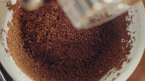 Top-Down View of Freshly Ground Coffee in a Cup Stock Footage 138251670