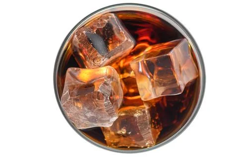 Top-Down View of a Glass Filled with Cola and Ice Cubes Stock Photos