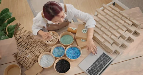 Top Down View, Go green Startup designer picking sample of sustainable material. Stock Footage 307681744