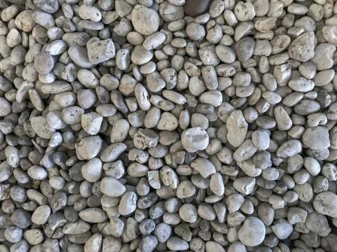 Top down view of gray spa sea stone pebble for background Stock Photos