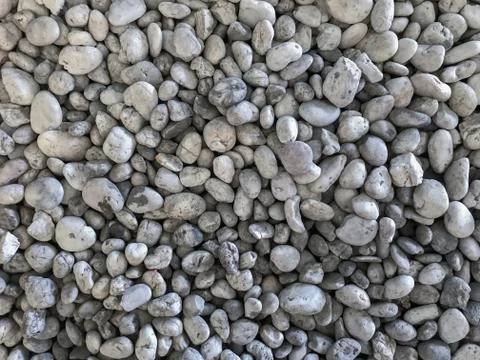 Top down view of gray spa sea stone pebble for background Stock Photos