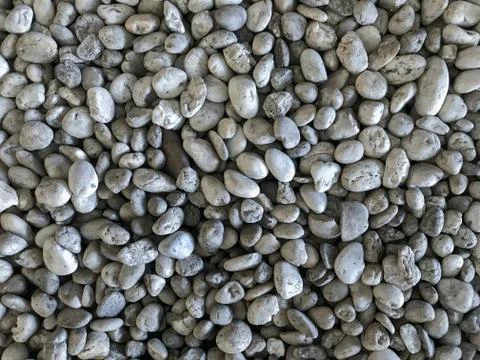 Top down view of gray spa sea stone pebble for background Stock Photos