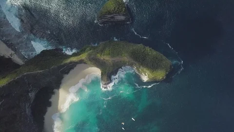 Top down view of the green peninsula with the perfect secret beach for honeymoon Stock Footage 101666126