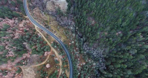 Top down view of grey car driving on an asphalt road Stock Footage 145990080