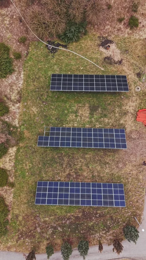 Top down view of ground mounted solar panels in Zduny Poland during winter Stock Footage 329449830