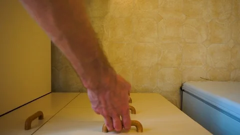 Top down view of hands opening kitchen draw, taking nothing, then closing 스톡 동영상 105349108