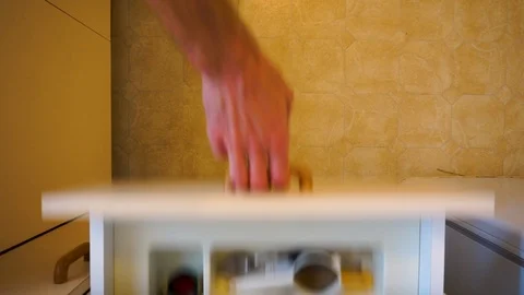 Top down view of hands opening kitchen cutlery draw, removing knife and 스톡 동영상 105349141