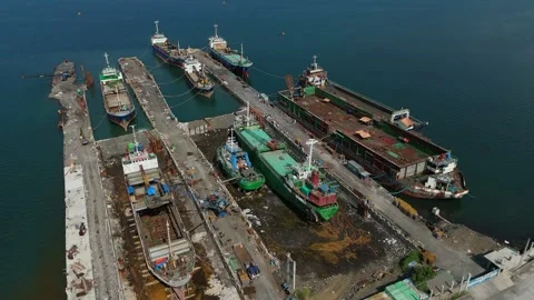 Top down view of harbour with many ships docked. Ideal for business concept Vídeos de archivo 335301269