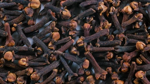 Top down view. Heap of dried whole cloves spice. Slider shot. Stock Footage 296518996