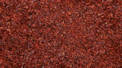 Top down view. Heap of red chili pepper flakes, slider shot. Stock Footage 296570994