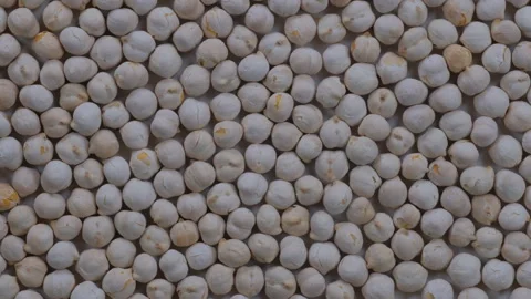 Top down view. Heap of Turkish style white roasted chickpeas in close detail Stock Footage 296519198