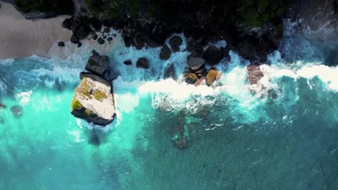 Top down view on hidden sandy beach with azure water Stock Footage 163366359
