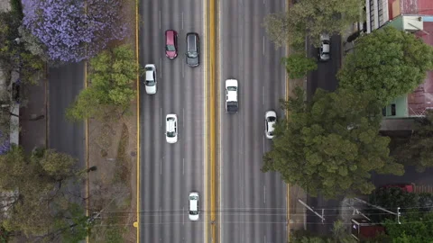 Top down view of a highway and reveal of Mexico City Stock Footage 152345733