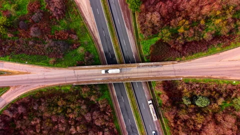 Top down view of highway bridge over crossing road 스톡 동영상 333840558