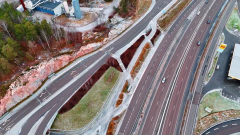Top down view of highway intersection and bus stop Stock Footage 332245996