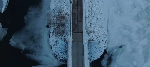 Top Down View Of Hudson Dike Bridge On The Frozen St. Croix River In Hudson WI Stock Footage 229761425