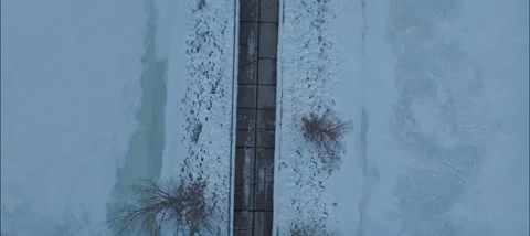 Top Down View Of Hudson Dike On The Frozen St. Croix River In Hudson WI Stock Footage 229761593