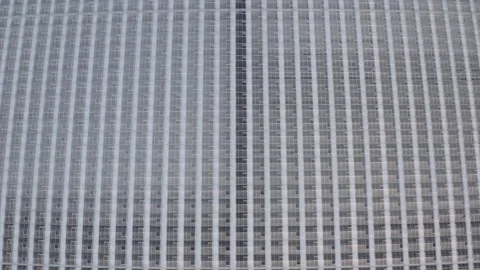 Top down view of a huge, symmetrical building, interesting architecture. Stock Footage 145888209