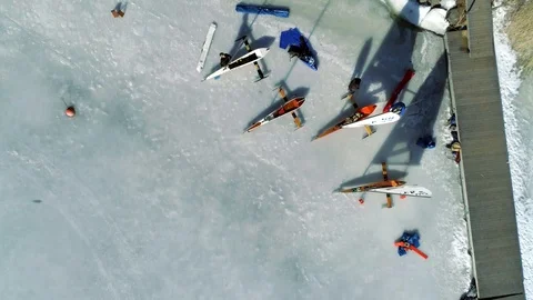 Top-down view of ice boats preparing for race (international DN class) Stock Footage 88201856