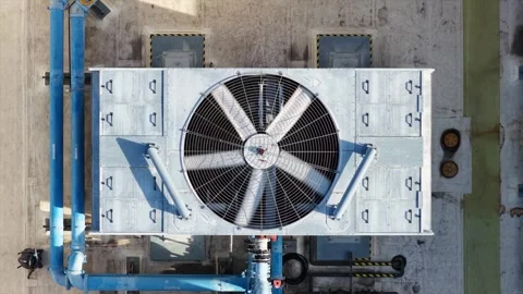 Top Down View of an Industrial Fan Rooftop Air Conditioner Cooling System Stock Footage 345024875
